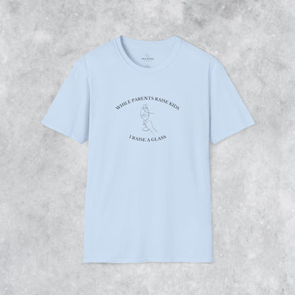 Funny T-shirt: While Parents Raise Kids I Raise a Glass