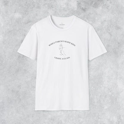 Funny T-shirt: While Parents Raise Kids I Raise a Glass