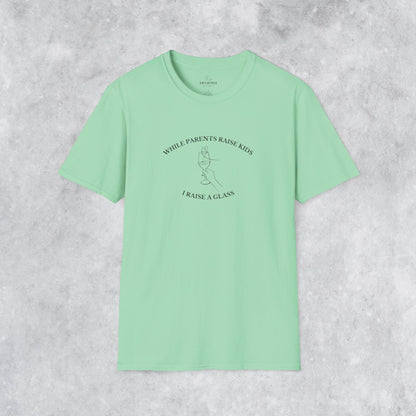 Funny T-shirt: While Parents Raise Kids I Raise a Glass