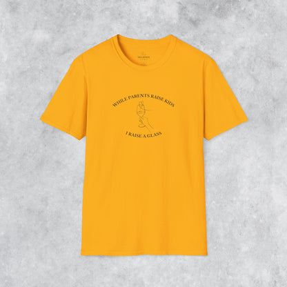 Funny T-shirt: While Parents Raise Kids I Raise a Glass